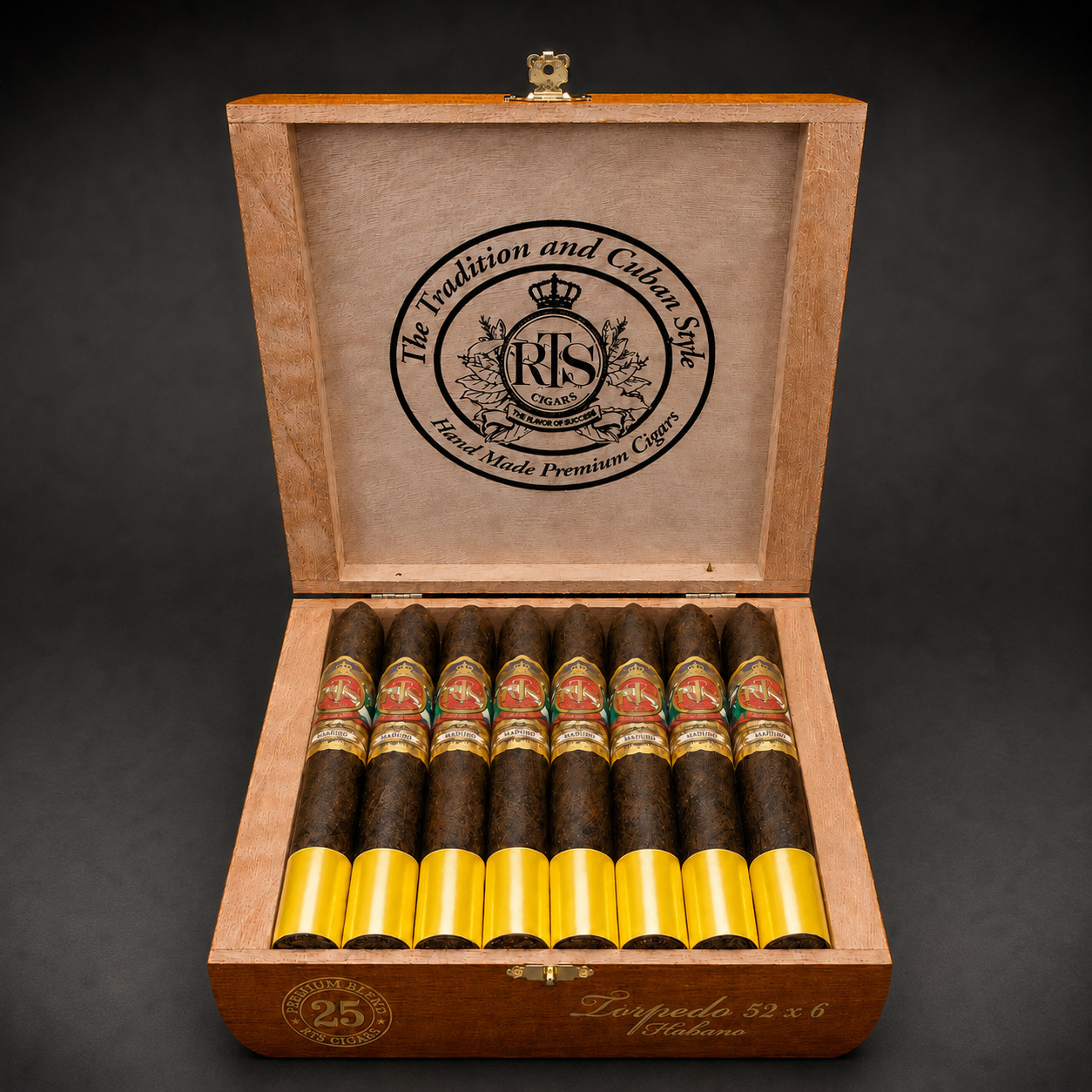 Open cedar box of 25 RTS Cigars Torpedo 52 x 6 Super Premium, hand-rolled torpedo-tipped cigars with gold RTS bands under a "Tradition and Cuban Style, Hand Made Premium Cigars" lid emblem